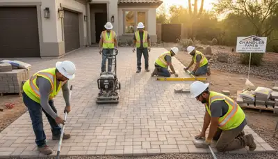 Crew installing driveway pavers in Chandler, AZ with precise leveling and base prep by Chop Chop Landscaping